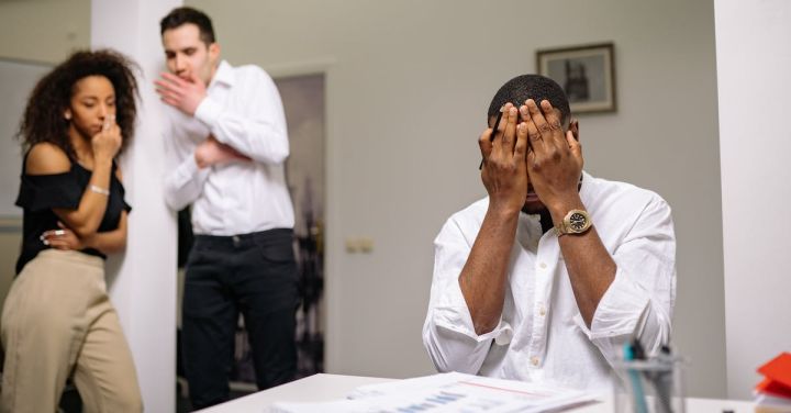 Workplace Conflict - Man in White Dress Shirt Covering His Face